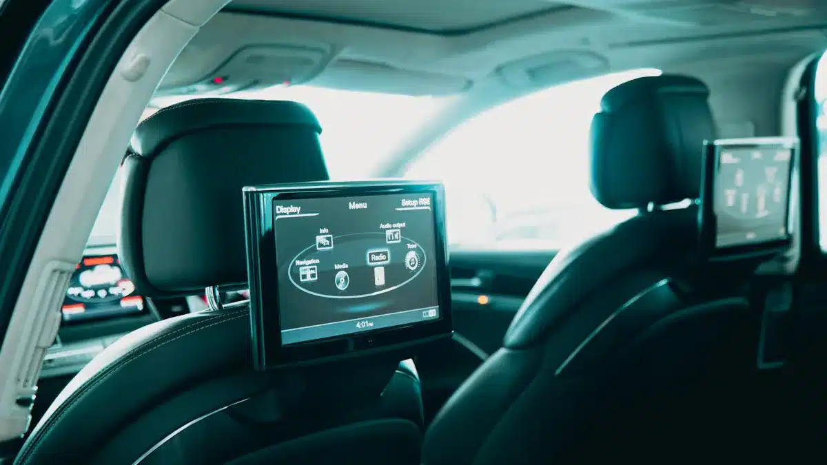 Pros and Cons of Headrest-Mounted Digital Screens for Your Car